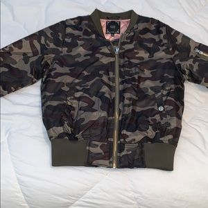 Never worn, camo puffer jacket!